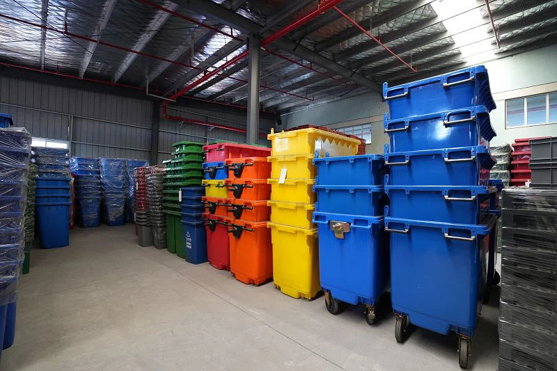 plastic garbage bins organized in warehouse plastic garbage bins organized in warehouse